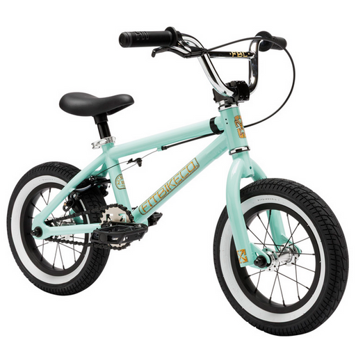 A mint green children's BMX-style bicycle with black handlebars, seat, and tires with white sidewalls, positioned against a white background in a side profile view showing both wheels and pedals.